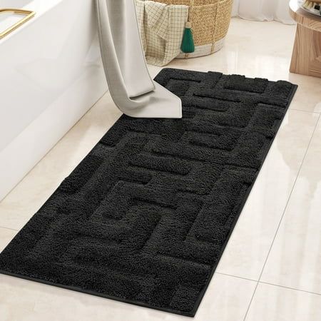 REINDEER FLY Bathroom Rug - your perfect bathroom companion! This bath rug is crafted from ultra-soft, high-quality polyester material that guarantees durability and long-lasting use. Experience ultimate comfort and functionality with this rug that adds a touch of luxury to your bathroom. The superior absorption technology ensures quick and effective water absorption, keeping your floor dry and clean. Say goodbye to slipping hazards! With its non-slip TPR backing, this bathroom mat stays firmly in place on any bathroom floor. Please ensure proper placement on a clean, dry, and flat floor for optimal safety. This bath mat easy to clean and fade-resistant. Simply toss it in the washing machine (preferably in a laundry bag) for quick and convenient cleaning. REINDEER FLY bath rug is available Black Decor For Bathroom, Black White Master Bath, Bathroom Decor Men, Black And Beige Bathroom Decor, Black Shower Curtain Bathroom Ideas, Black Bathroom Ideas Decor, Black And Brown Bathroom Ideas, Grey And Black Bathroom, Black And Grey Bathroom Ideas