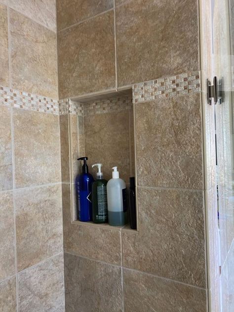 Before: Brown Shower Bathroom Decor With Tan Tile, Neutral Brown Bathroom Ideas, Brown Stone Bathroom, Brown Shower Tile Bathroom, Tan And Brown Bathroom, Bathroom Remodel Brown Tones, Brown Tile Bathroom Ideas, Brown And White Bathroom Ideas, Beige Tile Bathroom Color Schemes