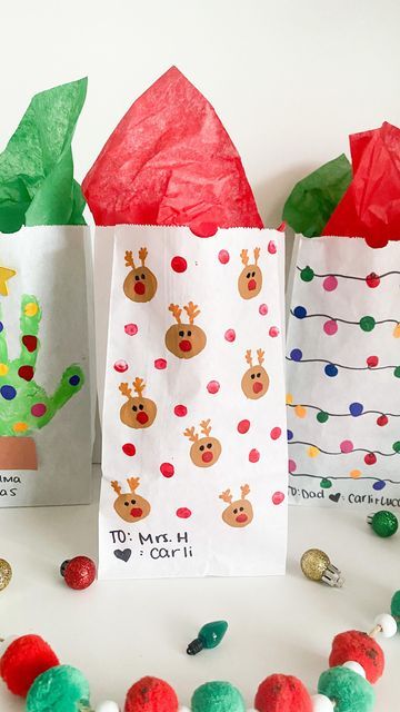 Christmas Bag Decorating Ideas For Kids, Christmas Finger Print Art Kids, Christmas Tree Fingerprint, Finger Print Christmas Lights Craft, Finger Print Art Kids Christmas, Christmas Ornaments For Kids To Make With Fingerprints, Make Your Own Gift Bags, Fingerprint Reindeer, Tree Fingerprint