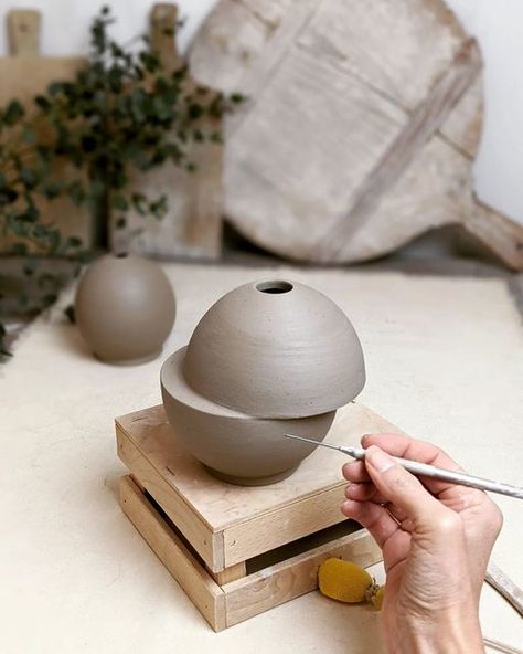 Michele Hickey Gemin on Instagram: "Revisiting and old design for a new client. I don't usually remake old designs, I often dislike much of what I do shortly after having done it, but I find this candle holder not terribly offensive. Whenever I throw a sphere, I make the bottom quite thick and start to form the sphere itself about a centimeter above the bottom of the clay so that I can create a base on which it can stand. In this case I left the base a bit wide for balance, but if I wanted a Old Design, A Globe, Polymer Clay Charms, Clay Charms, I Left, Candle Holder, Polymer Clay, Candle Holders, Charms