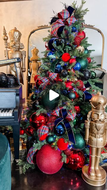 Jeanna Crawford on Instagram: "*Full tutorial is UP*   My golden Christmas nutcracker moment is here - and we get to celebrate it together with this full Christmas tree tutorial on You////Toob! It’s live now ✨❤️  Do you love how my heirloom ribbon in Plaid Glitz and Emerald Velvet tie it all together? 🫶🏻 Shop the collection at shopwithjlc.com (But please don’t wait - most remaining are in limited quantities and I don’t want you to be sad if we sell out of your favorite!)   What do you think?  #Christmastree #Christmasplaid #christmas #ChristmasNutcracker #Christmasribbon #Christmasornament #Christmasmirror #christmasdecorations #christmasdecor #christmasdecorating #christmasideas" Velvet Decor Christmas Tree, Blue Red And Gold Christmas Tree, Red Blue And Green Christmas Tree, Red Green And Blue Christmas Tree, Christmas Tree With Bells, John Mark Enterprises Christmas, Red Green Blue Christmas Tree, Nutcracker Christmas Decorations Ideas, Traditional Red And Green Christmas Tree