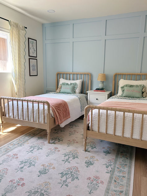 two twin beds with a blue board and batten wall Bedroom Twin Beds Guest, Gender Neutral Sibling Room, Two Twin Beds In A Small Room, Sister Room Loft Beds, Rug Under Two Twin Beds, Spindle Bed Girls Room, Small Room With Twin Bed Ideas, Twin Single Bedroom Ideas, Shared Headboard Two Beds