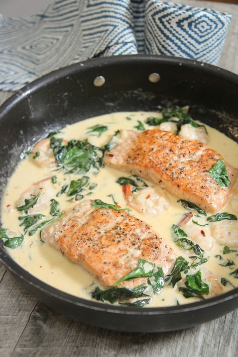 Creamy Garlic Salmon and Shrimp (Video) - Cooked by Julie Artichoke Salmon, Creamy Garlic Salmon, Tuscan Salmon Recipe, Salmon And Shrimp, Garlic Cream Sauce, Garlic Salmon, Salmon Seasoning, Creamy Spinach, Creamy Garlic