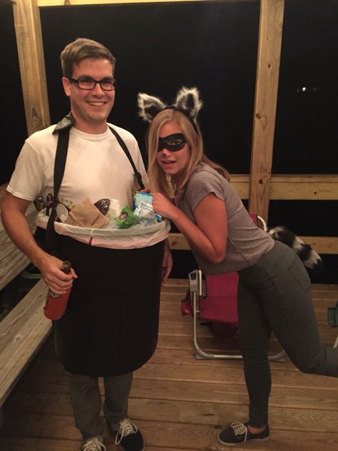 Raccoon couples costume Diy Raccoon Costume Women, Bag Of Trash Costume, Couples Animal Costumes, Raccoon Family Costume, Raccoon And Trash Can Costume, Cute Unique Couple Halloween Costumes, Racoon Halloween Costume, Baby Raccoon Costume, Dill Doe Halloween Costume