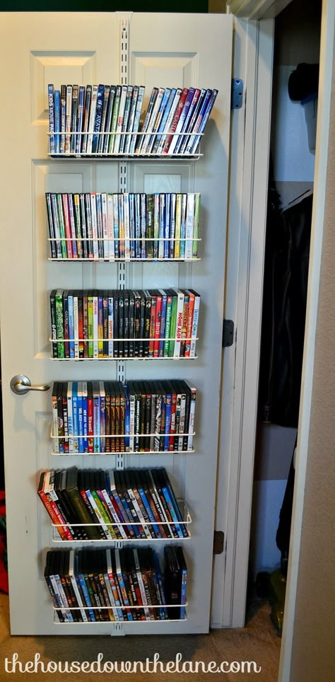 This DIY Movie Storage for Small Spaces project is a little time intensive, but it makes up for it in space and organization gained! | The House Down the Lane Movie Organization Ideas, Dvd Organization Ideas, Dvd Display Ideas, Hidden Storage Ideas For Small Spaces, Diy Dvd Shelves, Room Organizer Ideas, Diy Dvd Storage Ideas, Vhs Storage, Dvd Storage Ideas