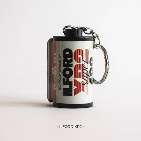 #BelieveInFilm! We give a second chance to used 35mm film canisters, turning them into awesome keychains. Show your love for film photography! We offer several styles - Kodak, Ilford, Fujifilm etc.  All the rolls of film have been used by me, then I have turned them into keychains!  --- FREE Film Canister, Portra 800, Portrait Photography Tips, 8mm Film, Holiday Outfits Christmas, Film Roll, Film Photography 35mm, Christmas Party Favors, Shoot Film