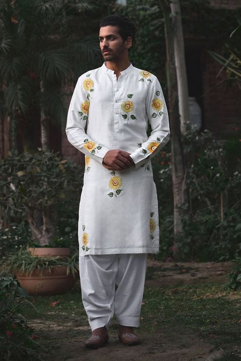 Shop for these amazing collections of Off White Dupion Raw Silk Hand Painted Alwar Sunflower Kurta And Set For Men by Ankit V Kapoor online at Aza Fashions. Kurta Painting Design For Man, White Salwar, Painted Sunflowers, Men Kurta, Salwar Pattern, Fabric Painting On Clothes, Kurta Design, White Kurta, Indian Groom