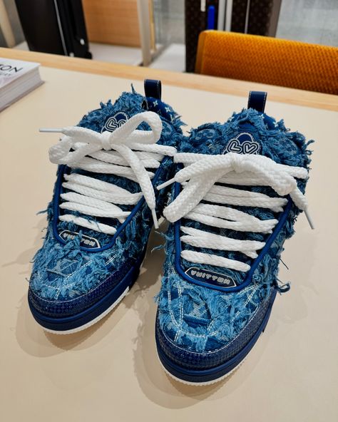 This edition of the LV Skate sneaker comes in frayed Monogram denim for a look that is both playful and fashionable. The oversized Monogram Flower on the side, which is a signature of this Nineties-inspired model, is also playfully distorted. Thick double laces and a chunky, bicolor outsole with Monogram Flowers finish this design. #leaguefits #louisvuitton #louisvuittonbags #louisvuittonbag #louisvuittonaddict #louisvuittonlover #lvcommunity #lvworld #leaguefits #hypebeast #saks #fashionblo... Lv Skate Sneaker, Sneakerhead Room, Drip Outfit Men, Style Outfits Men, Lv Shoes, Street Style Outfits Men, Ny Fashion, Streetstyle Fashion, Lv Monogram