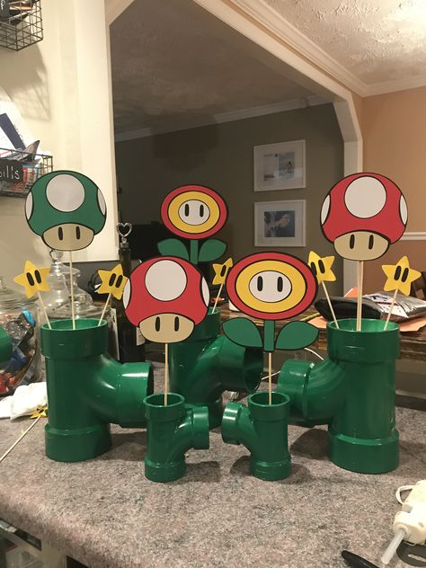 Super Mario Bros Table Centerpieces, Super Mario Bros Party Centerpieces, Luigi Party Ideas, Mario Birthday Party Table Decorations, Super Mario Party Decor, Mario Party Centerpieces, Super Mario Bros Centerpiece Ideas, Mario Kart Birthday Party Decoration, Mario Bros Party Ideas Decoration