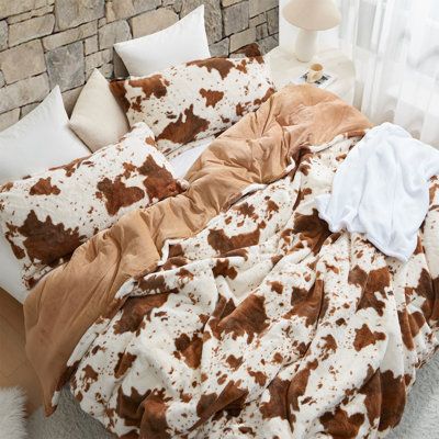 Gift yourself ultimate comfort with our Longhorn - Coma Inducer Oversized Comforter Set, for bedding that will add both style and a soft coziness to your bedroom. Size: King Comforter + 2 Shams | Byourbed Coma Inducer Longhorn Brown Cow Print Oversized Comforter Set Polyester / Polyfill / Microfiber in Brown / White | King Comforter + 2 Shams | Wayfair Boho Bedroom Women, Cozy Bedroom Western, Western Bed Comforters, Country Themed Bedroom, Country Teen Bedroom, Cow Comforter, Cow Bedroom, Oversized King Comforter, Western Room Ideas