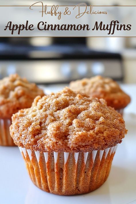 An apple cinnamon muffin placed on a white countertop Apple Biscuits Recipes, Cinnamon Muffins Easy, Cinnamon Muffins Recipe, Breakfast Pastry Recipes, Apple Cinnamon Muffins Recipe, Easy Muffin Recipe, Apple Muffins Healthy, Fall Muffins, Apple Muffin Recipes