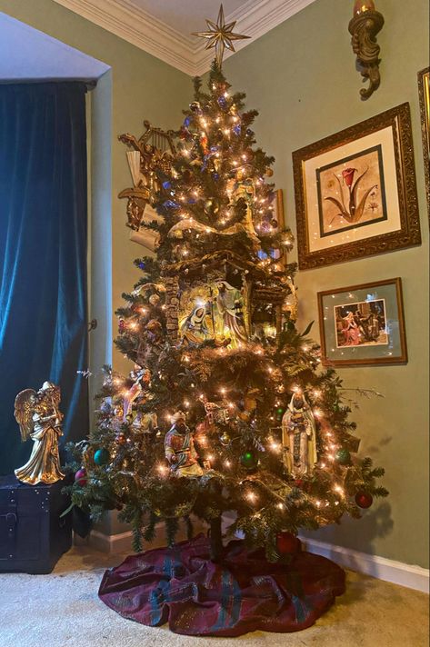 Nativity set displayed in a Christmas tree Nativity Themed Christmas Tree Ideas, Jesus Themed Christmas Tree, Jesus Christmas Tree, Nativity Christmas Tree, 12 Foot Christmas Tree, Nativity Tree, Theme Christmas Tree, 2024 Meals, Lds Christmas