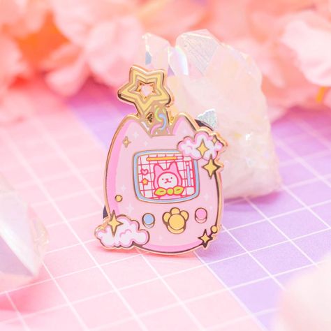 DS Moon Lite, CaTamagotchi and Cosmic Snacks enamel pins are finally back...!! Again..!! :D And just in time for MCM London too! ✨ - - - #artistsoninstagram #art #digitalart #enamelpin #enamelpins #pincommunity #pinkaesthetic #pink #pastel #pastelaesthetic #pastelpink #fanart #originalart #tamagotchi #retro #retrogaming #aestheticart #anime #aesthetic #kawaiiart #kawaiifashion #kawaii #cuteart #cutestuff #nintendods #dslite #y2k #babypink #gamergirl #cats Bedroom Desk Organization, 3d Pokemon, Aesthetic Pin, Ds Lite, Pin Cute, Bag Pins, Retro Accessories, 3d Modelle, Cute Pastel