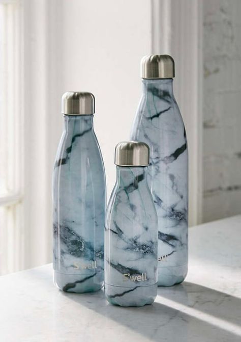 Get it from Amazon for $35 (medium size) or from Urban Outfitters for $25+ (available in three sizes and two colors). Marble Water Bottle, Copo Starbucks, Fancy Water Bottles, Swell Water Bottle, Crockery Design, Stylish Water Bottles, Trendy Water Bottles, Plastic Bottle Flowers, Stainless Steel Measuring Cups