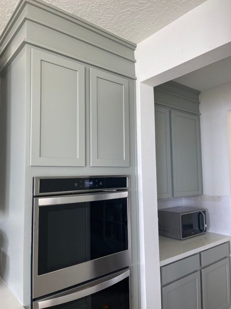 Kitchen Cabinet With Soffit, Kitchen Cabinets With Bulkhead, Kitchen With Bulkhead Cabinets, Moulding Above Kitchen Cabinets, Crown Molding On Kitchen Cabinets Different Color, Furr Downs Kitchen, Kitchen Bulkhead Ideas Crown Molding Above Cabinets, Upper Cabinet Molding, Modern Cabinet Trim Molding