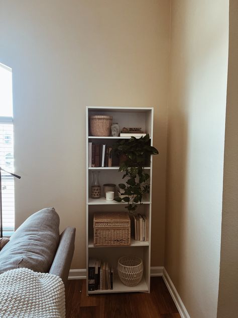 Super cute way to style an apartment! I have linked a similar bookshelf! Everything else is thrifted or books I have collected over the years. #ad Cute Simple Apartment, Bookshelf Small Space, Apartment Bookshelves, Small Bookshelf Ideas, Simple Apartments, Home Office Library, Office Library, Boho Inspo, Small Bookshelf