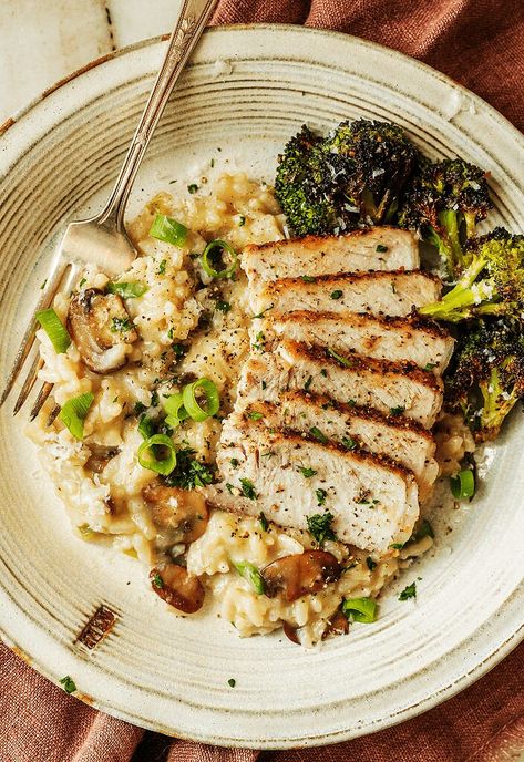 These pork chops are served with a luxurious mushroom-scallion risotto for an easy, filling dinner. The post Pork Chops with Mushroom-Scallion Risotto appeared first on Tried and True Recipes. Thick Cut Pork Chops, Pork Mushroom, Mushroom Pork Chops, Tried And True Recipes, Filling Dinner, Roasted Chicken Breast, Mushroom Risotto, Risotto Recipes, Onion Recipes