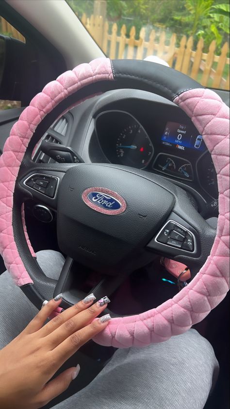 Cute pink steering wheel cover for ford Bedazzled Steering Wheel, Girly Steering Wheel Cover, Pink Wheel Cover, Cute Car Steering Wheel Cover, Cute Wheel Covers, Black Car Pink Accents, Pink Honda, Pink Steering Wheel, Fuzzy Steering Wheel Cover