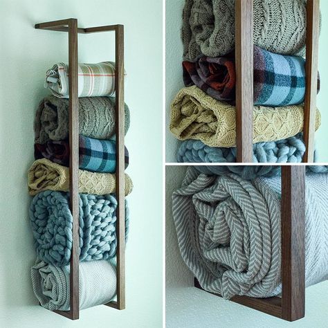 If you don't have any floor space, a great way to add extra storage is to look at your walls for room. A blanket shelf attaches to your wall and holds your blankets, rolled up, until you need them. This is also a great way to show off your blanket collection. #BlanketShelf #BlanketStorage #HomeDecor #ModernDecor Blanket Holder Wall, Blanket Storage For Nursery, Storage Ideas For Throw Blankets, Organize Blankets In Closet, Throw Blanket Holder, Storage For Blankets And Comforters, Rustic Blanket Storage, Blanket Storage Kids Room, How To Store Blankets And Comforters