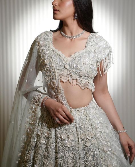 Ivory ensemble at Designs by Kaur to make you the spotlight for your special day. ✨ Contact us today at 437-994-4243 or come visit our designer studio at 14 Hobart Gardens, Brampton. #designsbykaur #ivory #ivorylehenga #indianbride #reception #lehenga #punjabibride #bride #wedding Engagement Lehengas, Bride Collection, Dress Pakistani, Reception Lehenga, Pakistani Style, Punjabi Bride, Lehenga Blouse Designs, Engagement Outfit, Jewellery Indian