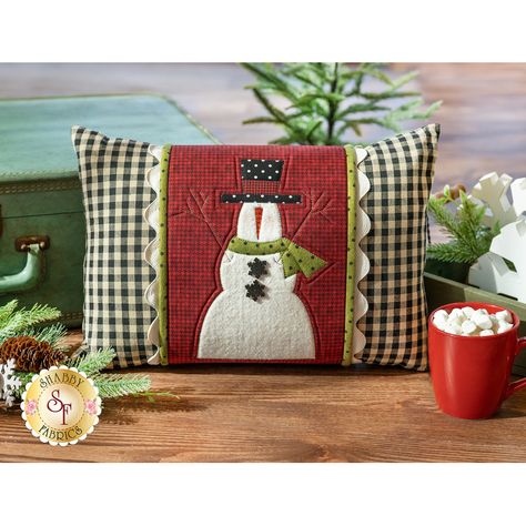 Have oodles of fun with the Frosty Flake Pillow Wrap & Cover Kit from The Whole Country Caboodle! Designed by Leanne Anderson & Kaytlyn Kuebler, this adorable wrap is easy to slip on and store, and it makes a wonderful addition to your seasonal decor. The cute applique design marries with a vintage farmhouse feeling that will bring you cheer throughout the year! Finished size of each pillow wrap is approximately 9" x 30" Finished pillow cover size is approximately 13" x 18-1/2" Follow along with Tammy as she shows you her favorite techniques for making the pillow case and wrap! Kit Includes: Pattern Towel for Pillow Cover All Fabrics to make the Pillow Wrap All Pre-Fused Laser Cut Appliqué pieces Ric Rac Buttons Foam Interfacing and Velcro Products Used: Country Caboodle Pil Holiday Pillows To Sew, Christmas Lumbar Pillow, Christmas Pillows To Sew, Homemade Christmas Pillows, Bazzar Gifts, Christmas Pillows Diy Sewing Projects, Christmas Quilt Projects, Holiday Pillows Diy, Christmas Pillow Patterns