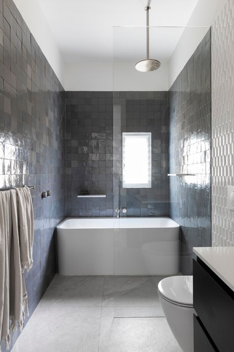 Bathroom Design featuring handmade blue/grey Zellige and arched white ceramic tiles. Blue Grey Bathroom Tiles, Bathroom Blue Grey, Organic Bathroom, Blue Grey Walls, Bathroom Blue, Coast House, Grey Bathroom Tiles, White Ceramic Tiles, Grey Wall