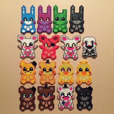 Love FNAF so much!! Made these little guys throughout the weeks! #fnaf #perlerbeads #colorful #animals #animatronics #cute #scary Perler Bead Patterns Fnaf, Fnaf Perler Beads, Perler Bead Designs, Fnaf Crafts, Pixel Beads, Perler Bead Templates, Diy Perler Bead Crafts, Bead Sprite, Hama Beads Patterns