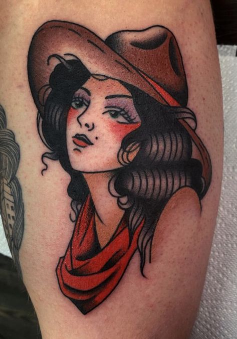 Done by @ joey.cowboy in Allstar tattoo, Limerick, Ireland Full colour traditional, inside bicep, woman, tattoo Traditional Tattoo Of A Woman, Outlaw Woman Tattoo, Western Chest Tattoo, Cowgirl Boots Tattoo, Lady Tattoo For Men, American Traditional Cowgirl Tattoo, American Traditional Cowgirl, American Traditional Cowboy Tattoo, American Traditional Cowboy