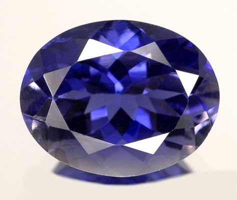 IOLITE - the name "iolite" comes from the Greek "ios", which means violet. The Vikings probably mined iolite from deposits in Norway and Greenland. Expensive Things, Iolite Stone, Faceted Gems, Bleu Violet, Types Of Gemstones, Minerals And Gemstones, Blue Gems, Rocks And Gems, Nerd Alert