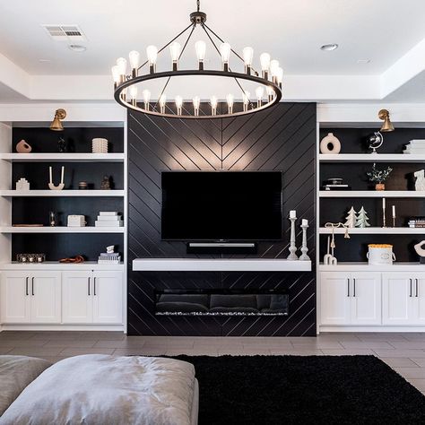 When black and white is the vibe 🖤🐇 It’s pretty cool that I get to design and build spaces like these. Sometimes the “I love my job”… | Instagram White And Black Built Ins, Loft Built Ins With Tv, Feature Wall With Tv And Electric Fireplace, Black And White Entertainment Center, Modern Black And White Fireplace, Black Living Room Built Ins With Tv, White Black Media Wall, Basement Black And White, Black And White Built Ins Living Room