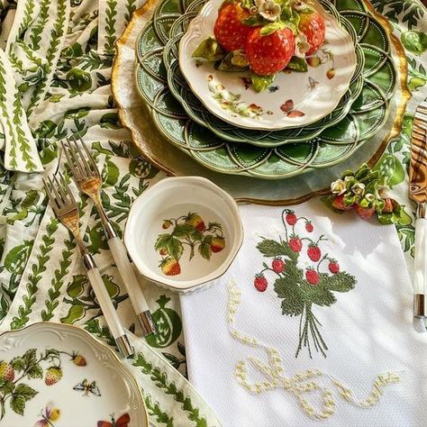 Angie Cumby Interiors on Instagram: "STRAWBERRY SEASON 🍓🍓🍓🍓 Inspired by these vintage plates I bought at an estate sale with little butterflies and strawberries painted on them, not to mention the porcelain strawberries by Eva Gordon. #friday#funday#strawberry#estatesale#butterflies#vintageplates#inspiration#sculpture#details#porcelainsculpture#makesmehappy#embroidery#embroiderydesign#bow#platestack#tablescape#stitchandstage#teatowel#custom#victoriamagazine#southerncharm#machineembroidery#ba Pretty Tablescapes, Grain Filler, Strawberry Dishes, Friday Funday, Fruit Centerpieces, Strawberry Season, Summer Tables, Table Set Up, Spring Table