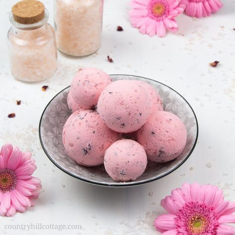 Whether you need at-home relaxation or want to jazz up bath time, easy fizzy DIY Himalayan salt bath bombs are a true wellness treat. Made with skin-smoothing shea butter and soothing essential oils, the simple homemade moisturizing bath fizzies are the best way... #aromatherapy #bathbombs #beauty Himalayan Salt Bath, Moisturizing Bath, Salt Bath, Bombe Recipe, Homemade Bath, Bath Bomb Recipes, Bath Fizzies, Scrub Recipe, Dried Rose Petals