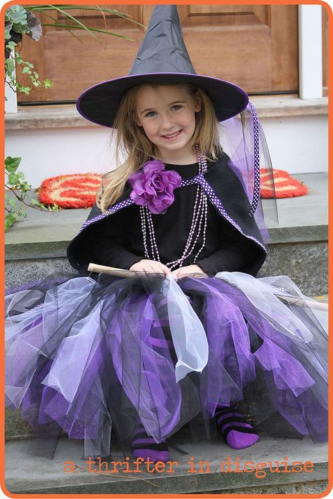 My daughters decided to be witches for Halloween this year, and I had so much fun putting this costume together. The pièce de résistance was this super-easy, super-inexpensive tutu! Instructions for DIY Witch Tutu Skirt 1. Cut your elastic according to size. To get the right size, measure your little one's waist and then subtract roughly 2 inches. This allows for some stretch and ensures the tutu won't fall down when she's wearing it. 2. Sew your elastic closed. The best method I have found Witch Costume Diy, Witch Tutu, Diy Tutus, Mother Daughter Projects, Diy Tutu, Witch Costumes, Thanksgiving Wreath, Adornos Halloween, Witch Diy