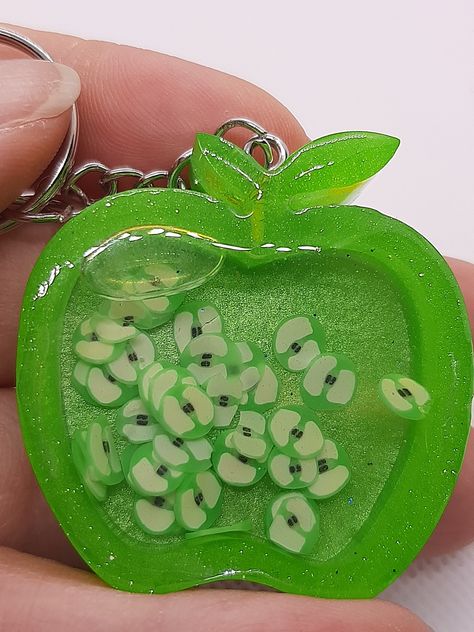 Kawaii two-tone green apple shaker keychain with cute green apple shapes inside. Green Apple Aesthetic, Trinket Aesthetic, Makeup Pallettes, Micro Pig, Big Macintosh, Apple Aesthetic, Shaker Keychain, Micro Pigs, Lovecore Aesthetic