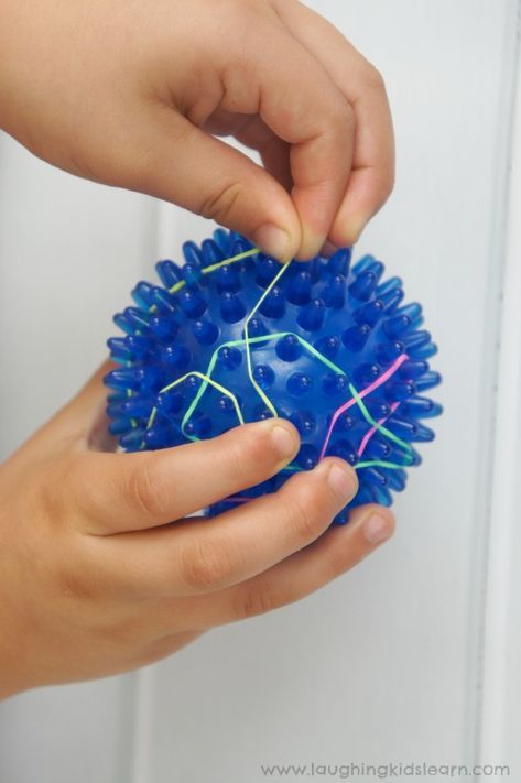 pulling loom bands for fine motor skills on a ball #loombands #kidsplay #simpleplayideas #finemotorskills #finemotor #lovetoplay #children #preschooler #toddler #school #homeschool Preschool Fine Motor Activities, Fine Motor Activity, Fine Motor Activities For Kids, Occupational Therapy Activities, Preschool Fine Motor, Gross Motor Activities, Fine Motor Skills Activities, Motor Skills Activities, Hand Therapy