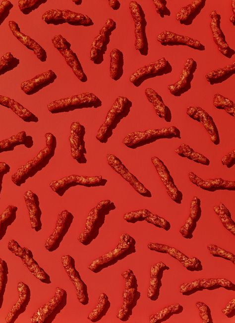 What's Inside Flamin' Hot Cheetos? <em>Probably</em> Something Spicy |   | Credit: The Voorhes | From WIRED.com Flamin Hot Cheetos, Cheetos Crunchy, Spicy Candy, Hot Cheetos, Ad Photography, Food Patterns, Food Backgrounds, Food Wallpaper, Food Info