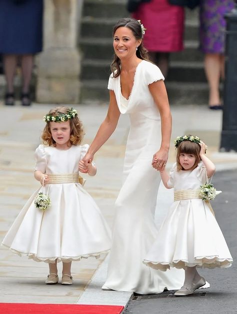 Pippa Middleton's plunging silk gown was poles apart from royal bridesmaid dress | HELLO! Pippa Middleton Dress, Pippa Middleton Wedding, Prince William Family, Middleton Wedding, Sister Bridesmaid, Mcqueen Dress, Focal Wall, Leopard Print Scarf, Pippa Middleton