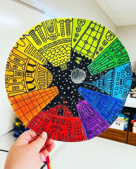 @artwith.mrs.r on Instagram: "Colorful color wheel cities from 5th! 🌈 . . . #artteacher #artclass #elementaryteacher #art #artist #classroom #littleartist #artteachersofinstagram #kidsart #artteacherlife #arteducation #artwork #colors #elementaryart #design #iteachart #artlesson #crayola #artlesson #artprojects" Colour Wheel Design Ideas, Color Wheel Design, Color Wheel Art Projects, Color Wheel Projects, Color Art Lessons, Color Wheel Art, Primary School Art, Mary Blair, 3rd Grade Art