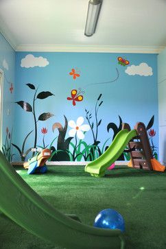 This would be a great idea. Decorate a portion of the play room to look like outside, put playground equipment in it. Can play "outside" even on a rainy or cold day! Nursery Photos, Children's Play Area, Daycare Decor, Daycare Design, Preschool Rooms, Church Nursery, School Murals, Playground Design, Kids Nursery