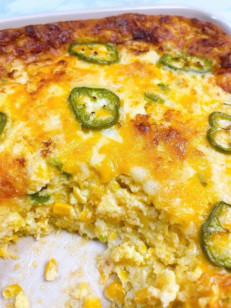 cheesy jalapeno corn casserole easy jiffy recipe hero image baked with scoop removed. Corn Casserole Jiffy Jalapeno, Best Jalapeño Corn Casserole, Jalapeno Cornbread Casserole, Cornbread Casserole Jalapeno, Corn Jalepeno Casserole, Jiffy Corn Casserole With Jalapenos, Jiffy Jalapeno Cheddar Cornbread With Cream Corn, Jalapeno Corn Casserole Jiffy, Corn Casserole Jiffy With Green Chilies