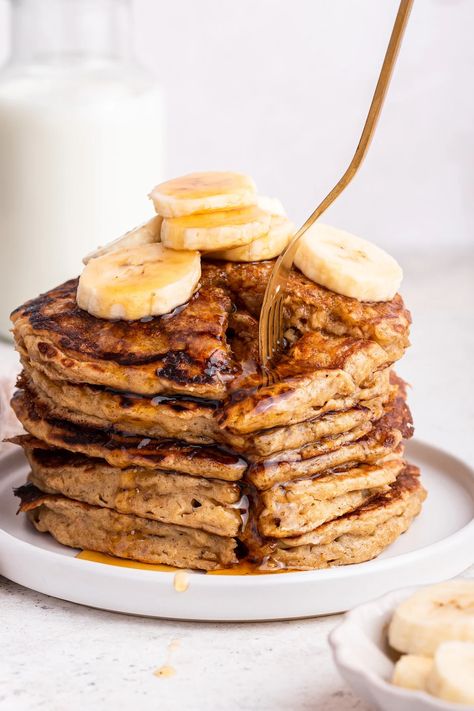 These healthy overnight oatmeal pancakes are hearty and packed with nutritious ingredients like rolled oats, whole wheat flour and Greek yogurt. They make for a quick and easy breakfast that the whole family will love! Healthy Overnight Oatmeal, Greek Yogurt Blueberry, Greek Yogurt Oatmeal, Overnight Oatmeal Healthy, Blueberry Pancakes Recipe, Greek Yogurt Pancakes, Whole Wheat Pancakes, Baked Oatmeal Recipes, Homemade Almond Milk