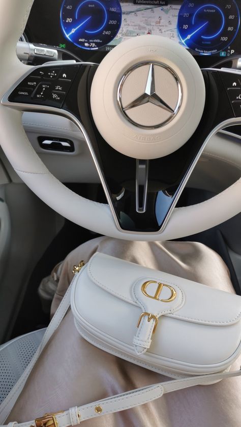 White Dior bag inside a cream Mercedes on top of a gold satin skirt Mercedes Benz Mom Aesthetic, Mercedes Mom Aesthetic, Rich Mom Lifestyle, Mercedes Aesthetic Interior, Expression Board, Mercedes Girl, Rich Mom, Mercedes Wallpaper, Story Cover