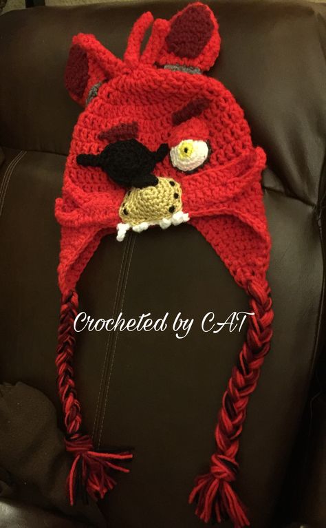 “Five Nights at Freddy’s Foxy Inspired Hat” paid pattern from www.ravelry.com I hated making this hat. Fnaf Foxy Crochet Pattern, Fnaf Crochet Hat, Fnaf Crochet, Crochet Mickey Mouse, Crochet Character Hats, Cat Embroidery Design, Animal Sewing Patterns, Hand Embroidery Tutorial, Crochet Fashion Patterns