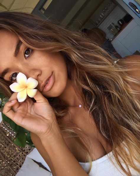 ERYN KROUSE on Instagram: “Gooood morning! Michael is fixing me up some tea and avo toast in the background and I am a happy girl because there’s a frangipani tree…” Beachy Brunette Hair, Sun Kissed Brown Hair, Summer 2020 Hair Color Trends, Frangipani Tree, Surfer Girl Hair, Eryn Krouse, Gooood Morning, Surf Hair, Avo Toast