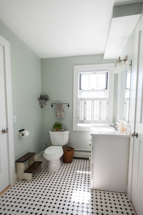 House Tour: Amy & Peter’s Minimalist Home | Apartment Therapy Light Green Bathrooms, Mint Green Bathrooms, Sherwin Williams Sea Salt, Mint Bathroom, Makeover Kamar Mandi, Light Green Walls, Sea Salt Sherwin Williams, Green Bathroom Decor, Bathroom Paint