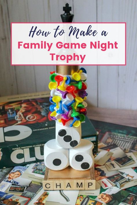 Having a handmade rotating family game night trophy makes game night a lot more fun!  Celebrate the nights champion with this game night trophy or let the winner hold it at the end of each game.  This easy framily craft will make family game nights memorable and leave fun stories to tell for generations to come. We are also talking great Family Game Night Ideas and Tricks! Game Night Trophy, Diy Family Games, Family Game Night Party, Game Night Decorations, Diy Trophy, Trophy Diy, Game Night Food, Adult Game Night, Game Night Gift