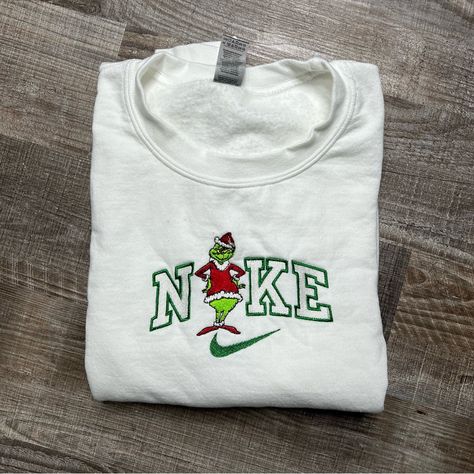 This Crewneck Is Embroidered And Comes In All Sizes And Colors. Unisex Sizing. Grinch Nike Sweatshirt, Nike Grinch Sweatshirt, Grinch Crewneck Sweatshirt, Nike Christmas Sweatshirt, Christmas Nike Sweatshirt, Vintage Christmas Sweatshirts, Cute Christmas Hoodies, Christmas Embroidered Sweatshirt, The Grinch Clothes