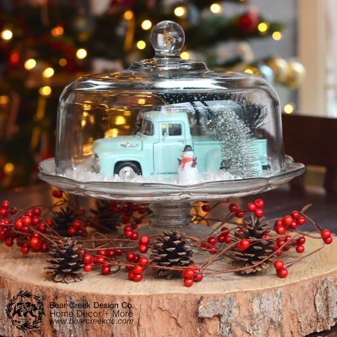 Snow Globe Cake Stand / DIY Snow Globe / DIY Blogger / #christmasdecorations #snowglobe #diysnowglobe #cakestandsnowglobe / Christmas Decor / DIY Christmas Decor / Holiday Decorations Cake Dome Decor, Snowglobe Centerpiece, Snow Globe Cake, Charlie Brown Christmas Decorations, Cake Stand Centerpiece, Christmas Cake Stand, Globe Cake, Creek Design, Glass Cake Dome