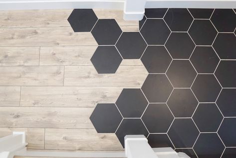 Throw back Thursday to this cool entryway. Still loving the modern hex tile to wood flooring transition that the homeowner requested. • •… Hexagon Tiles Entryway, Hex Tile To Wood Transition, Black Hexagon Tile Bathroom Floor Ideas, Hexagon Tile Entryway, Wood Flooring Transition, Black Hexagon Tile Floor, Hex Tiles Bathroom, Black Tile Bathroom Floor, Large Hexagon Tile