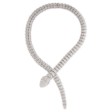 . A timeless piece of jewelry that snakes around your neck, encrusted with diamonds. #Bulgari #Serpenti #Diamond #Necklace . #Snake_Necklace_Bulgari #Serpent_Necklace_Bulgari #Bvlgari_Snake_Necklace #Bulgari_Snake_Necklace Bulgari Serpenti Viper Necklace, Snake Necklace Bulgari, Bulgari Jewelry Snake, Snake Diamond Necklace, Bvlgari Jewelry Aesthetic, Bulgari Snake Necklace, Bvlgari Serpentine Necklace, Bvlgari Snake Necklace, Bulgari Diamond Necklace